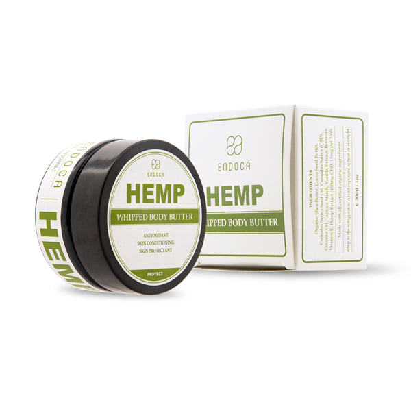 A jar and box of Endoca Hemp whipped body butter product shown against white background. The packaging features green and white minimalist design with antioxidant and skin conditioning benefits listed.